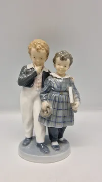 Original figur, "Flugten til Amerika" fra Royal Copenhagen, designet af Christian Thomsen