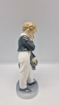 Original figur, "Flugten til Amerika" fra Royal Copenhagen, designet af Christian Thomsen