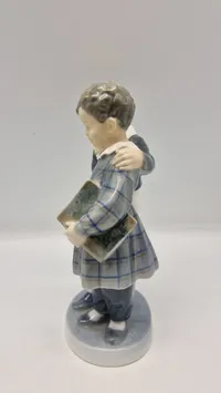 Original figur, "Flugten til Amerika" fra Royal Copenhagen, designet af Christian Thomsen