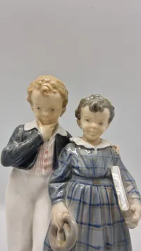 Original figur, "Flugten til Amerika" fra Royal Copenhagen, designet af Christian Thomsen
