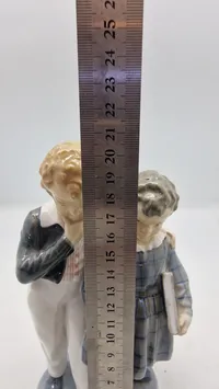 Original figur, "Flugten til Amerika" fra Royal Copenhagen, designet af Christian Thomsen