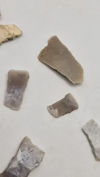 Samling miniature stenøkser