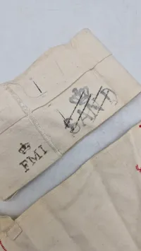 Samarit armbind og hjelmomslag