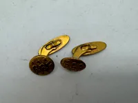 Originale manchetknapper, forsvaret