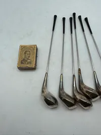 Samling miniature golfkøller af nysølv