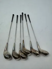 Samling miniature golfkøller af nysølv