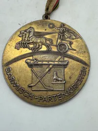 Medalje fra vinter-OL 1936, som blev afholdt i Garmisch-Partenkirchen, Tyskland