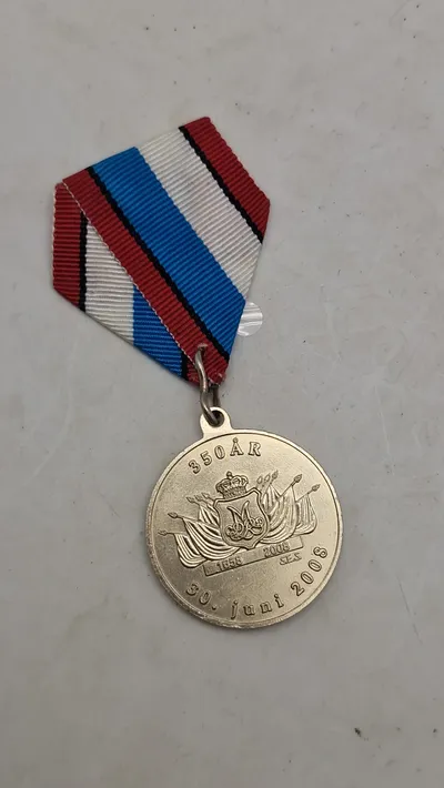 Medaljen udgivet i anledning af 350-års jubilæet for Den Kongelige Livgarde, som blev grundlagt i 1658