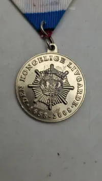 Medaljen udgivet i anledning af 350-års jubilæet for Den Kongelige Livgarde, som blev grundlagt i 1658