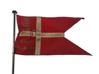 Bordflag til minde om soldatertiden (42-43) med påsat M/23 mærke
