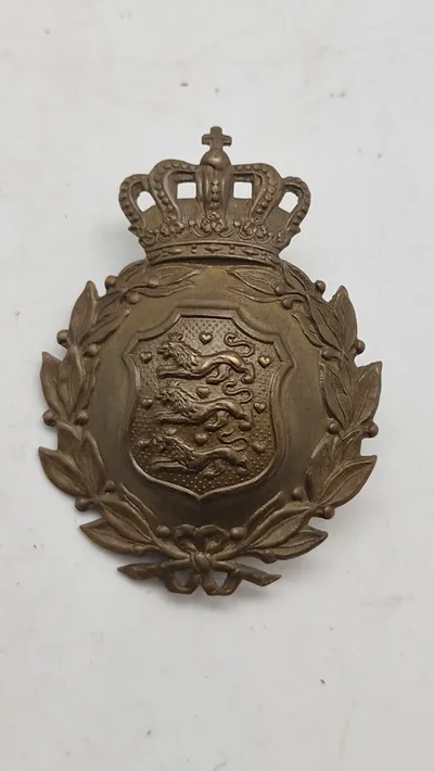 Originalt M/23 hjelmmærke