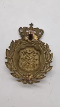 Originalt M/23 hjelmmærke