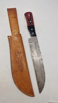 Veludført kniv med klinge af Damaskus stål