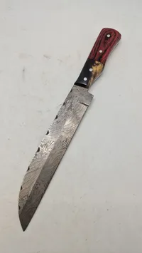 Veludført kniv med klinge af Damaskus stål