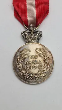 Sjælden originalt eks. af Kong Christian den X.s frihedsmedalje, også kendt som "Pro Dania” sølv