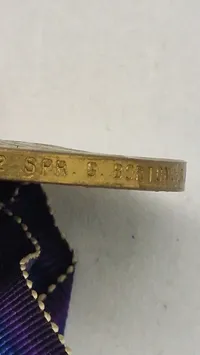 Original amerikansk sejrsmedalje fra Første Verdenskrig (World War I Victory Medal). Navngiven