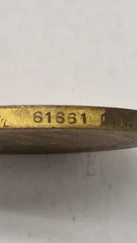 Original amerikansk sejrsmedalje fra Første Verdenskrig (World War I Victory Medal).  Navngiven