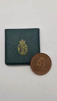 Original mønt fra det danske hjemmeværn for duelighedskydning med æske