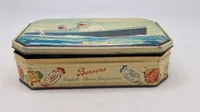 metaldåse, der viser passagerskibet SS United States
. Skibet, også kendt som "The Big U", blev bygget i 1952 og var et berømt amerikansk oceanskib