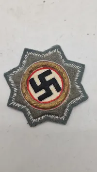 Deutsches Kreuz in Gold (DKIG) Heer cloth version, original???