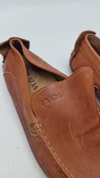 Originalt sæt Prada sko, nypris ca 11000,- - en syning er gået i stykker