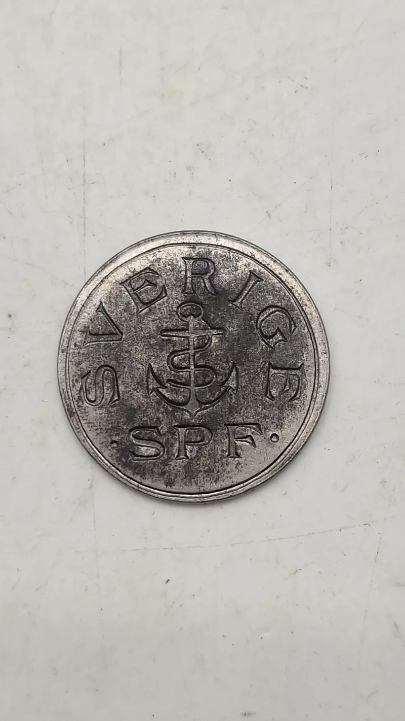Original mindemedalje for panserskibet Sverige, præget i materiale fra skibets panserplader