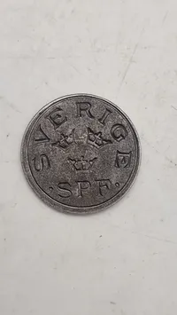 Original mindemedalje for panserskibet Sverige, præget i materiale fra skibets panserplader