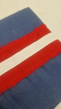 Originalt armbind fra den danske modstandsbevægelse