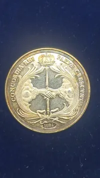Original sølvmønt med Emdens historie og dens mønttradition
