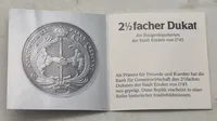 Original sølvmønt med Emdens historie og dens mønttradition
