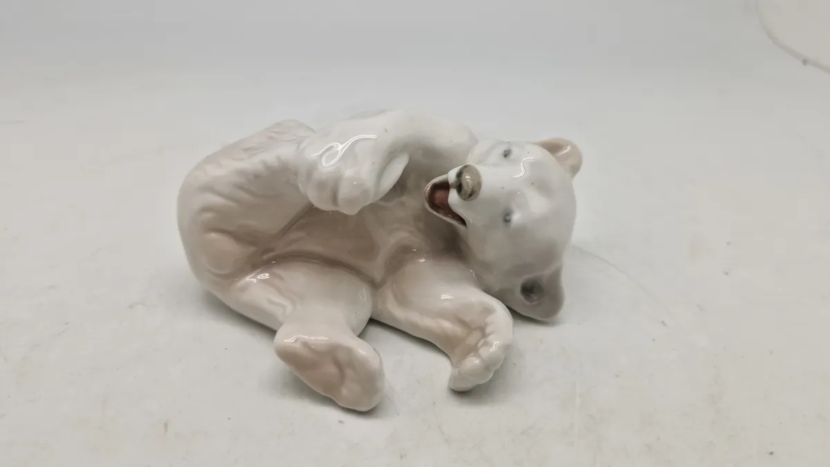 legende isbjørneunge, Royal Copenhagen figur nr. 729, designet af Knud Kyhn