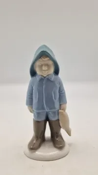 Dreng med fisk porcelænsfigur | GH & Co. Tyskland