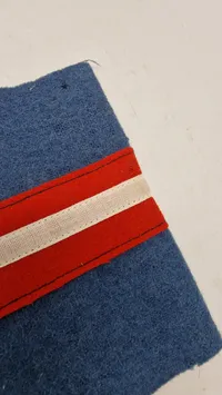 Armbind fra den danske modstandsbevægelse. Originalt.