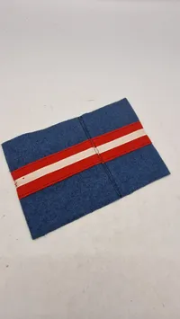 Armbind fra den danske modstandsbevægelse. Originalt.