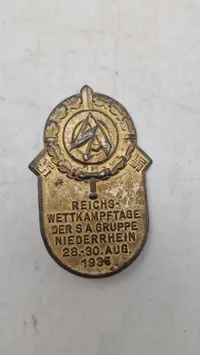 Reichswettkampftage der SA Gruppe Niederrhein tinnie/badge fra 1935. Original