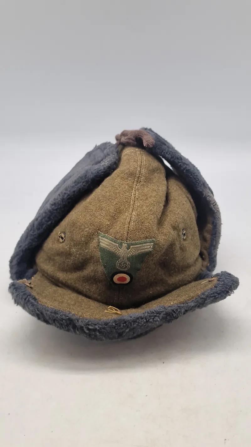 Sjælden russisk ww2 vinterhue, genanvendt af de tyske tropper. Original
