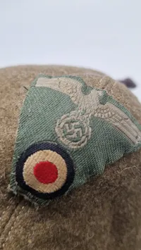 Sjælden russisk ww2 vinterhue, genanvendt af de tyske tropper. Original
