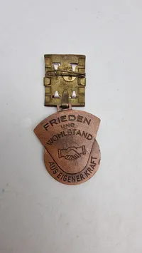Aktivist des Fünfjahrplanes" (Aktivist for femårsplanen) fra DDR (Østtyskland), original