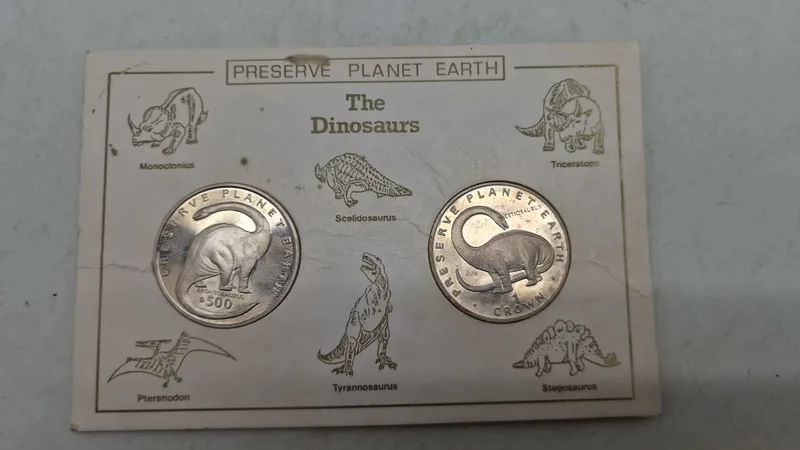 samlermønter med dinosaurnavne og -billeder, sølv