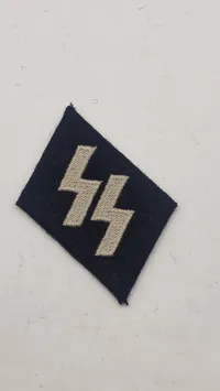 Waffen-SS tab, efterkrigs