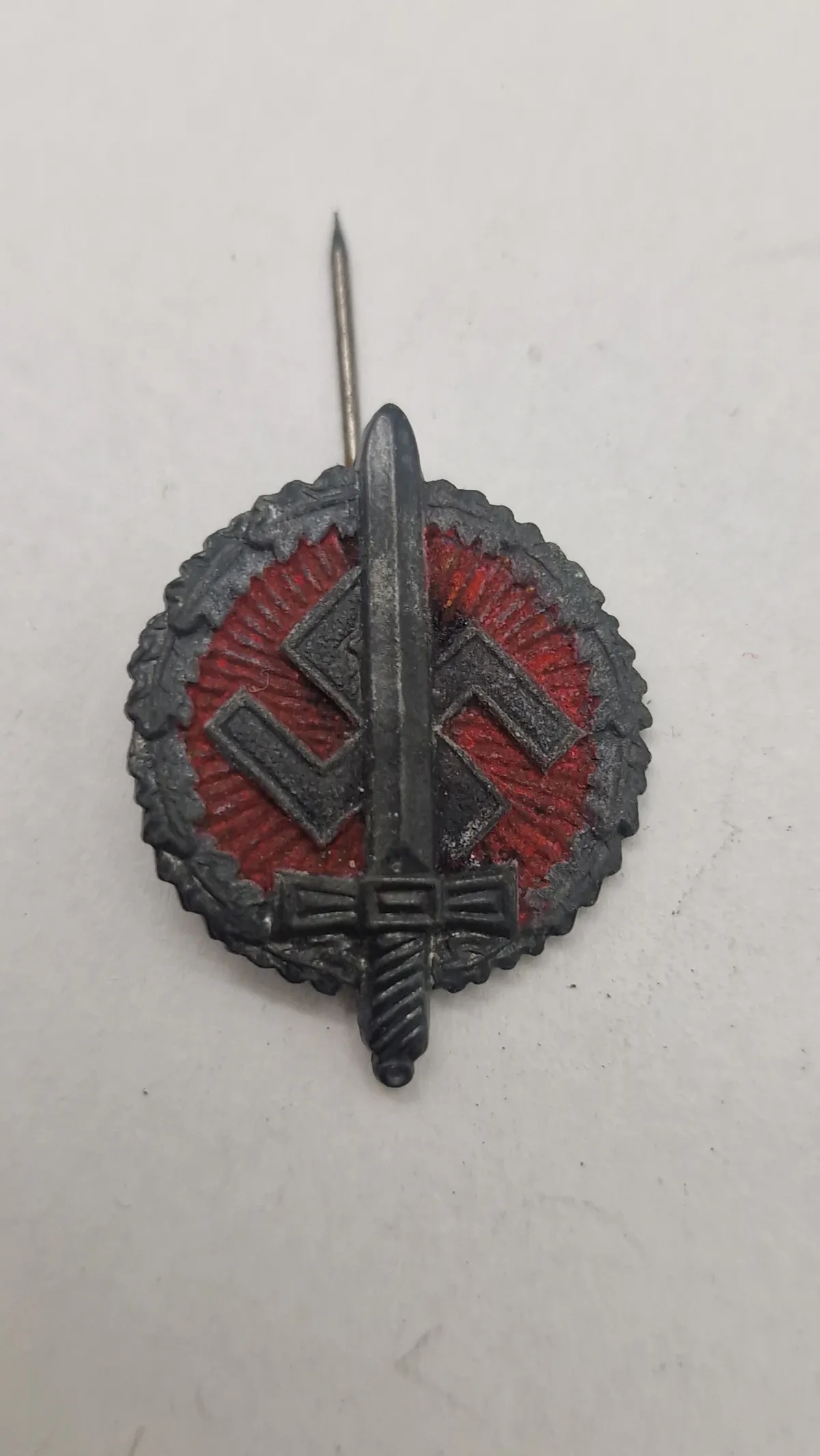 Nationalsozialistische Kriegsopferversorgung (NSKOV) tinnie. Original