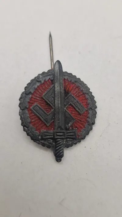 Nationalsozialistische Kriegsopferversorgung (NSKOV) tinnie. Original
