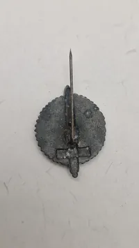Nationalsozialistische Kriegsopferversorgung (NSKOV) tinnie. Original