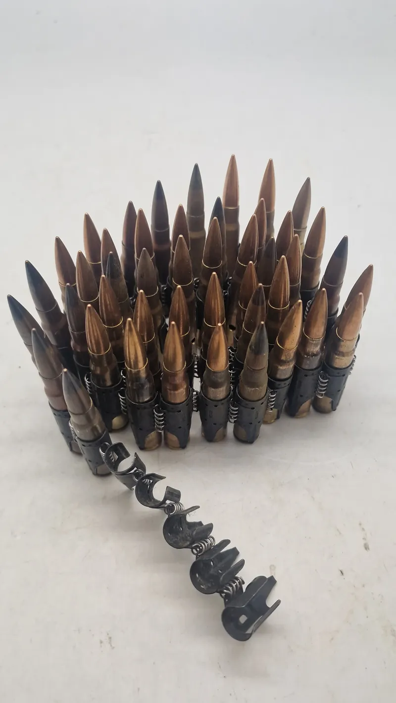 Bælte til mg/34/42 fra ww2 med deaktivererede patroner. Originalt