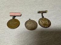 Samling Carlsberg medaljer, soltegn mm.