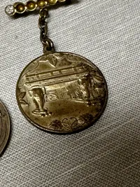 Samling Carlsberg medaljer, soltegn mm.