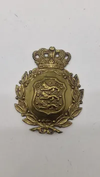 Dansk M/23 hjelmmærke. Originalt