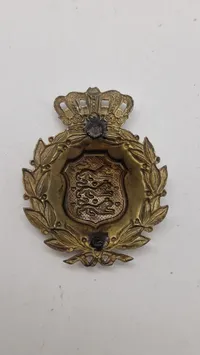 Dansk M/23 hjelmmærke. Originalt
