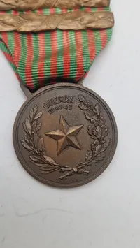 Italiensk erindringsmedalje fra 2. verdenskrig, kendt som "Medaglia commemorativa del periodo bellico 1940-43". Original