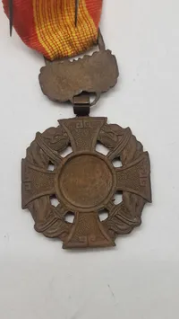 Sydvietnamesisk Gallantry Cross (Vietnamesisk: Anh-Dũng Bội-Tinh). Original